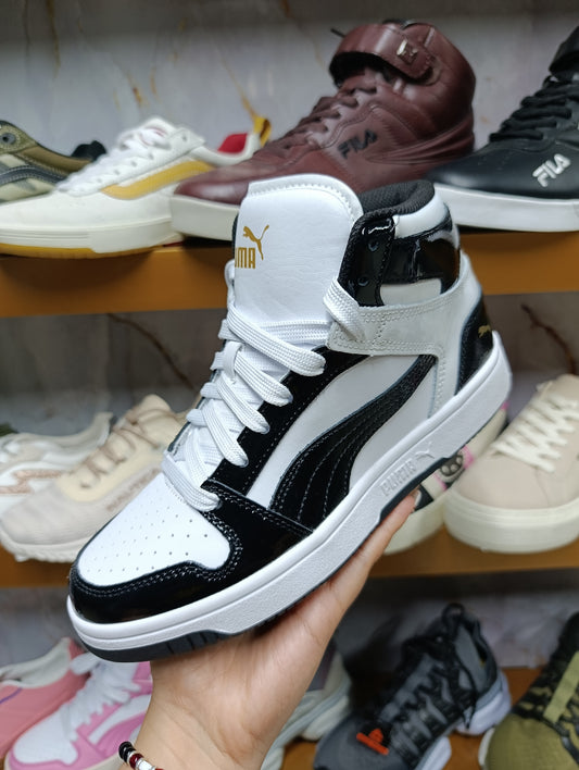 Calzado para caballero PUMA.